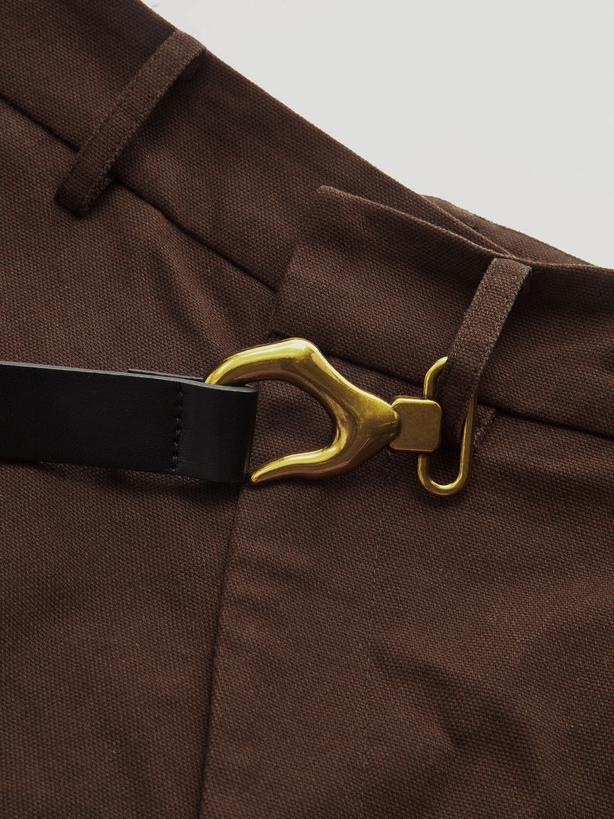 Asymmetric Belted Curved-Leg Pants